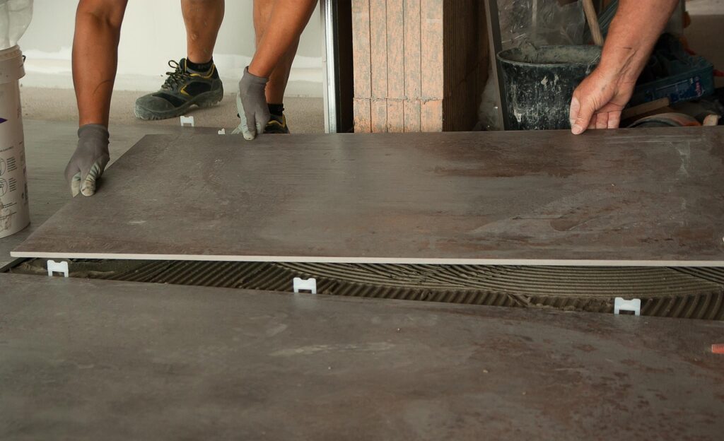 pose de carrelage grand format avec calles auto nivelantes